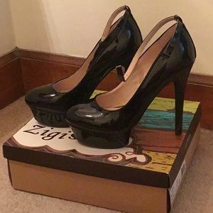 Black patent leather pumps